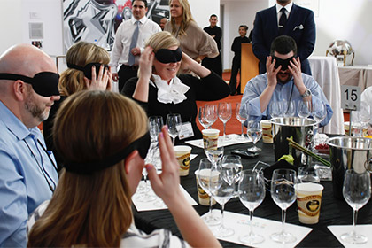 blindfolded wine sipping